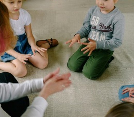 Children engaging in a craft activity at Quokka Kids in Beaver Dam.
