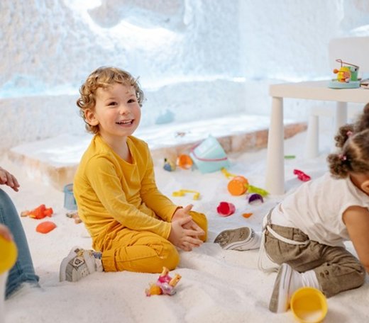 Children enjoying outdoor play at Quokka Kids in Beaver Dam, WI, promoting play-based learning.