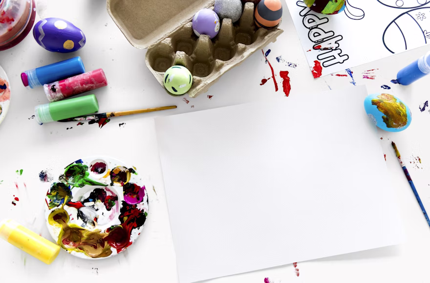 Group of toddlers collaboratively playing with colorful building blocks, developing fine motor skills and creativity at Quokka Kids
